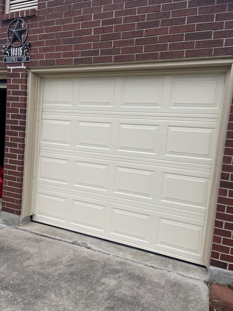 Garage door on red brick home